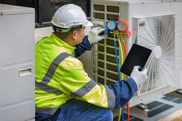 Professional Heat Pump Repair technician working in Salem, IN